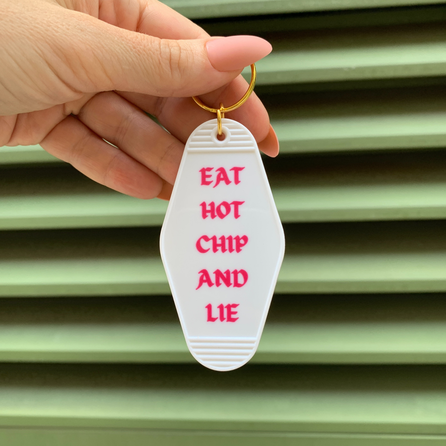 Eat Hot Chip and Lie Motel Style Keychain in White
